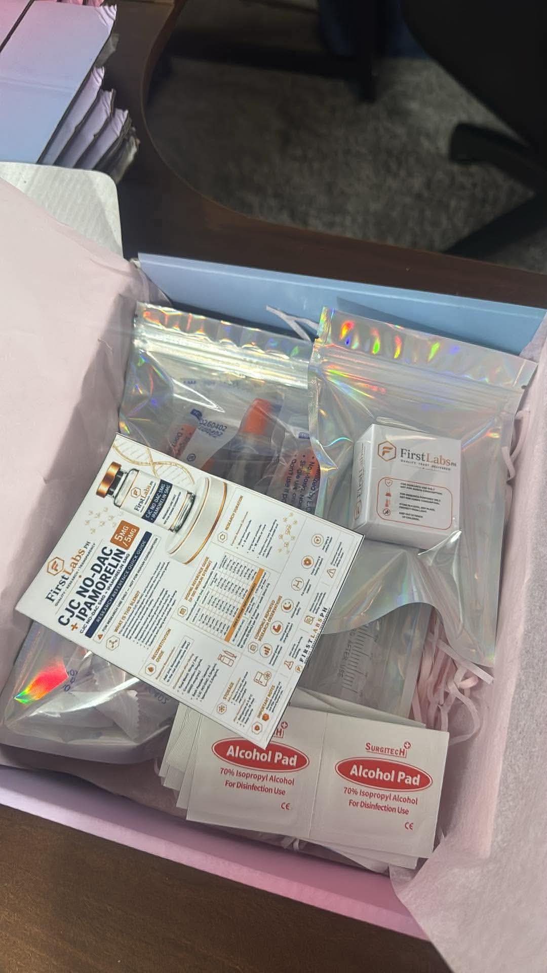 FirstLabs PH order with CJC No-DAC + Ipamorelin research guide, holographic pouches, boxed vials and alcohol pads