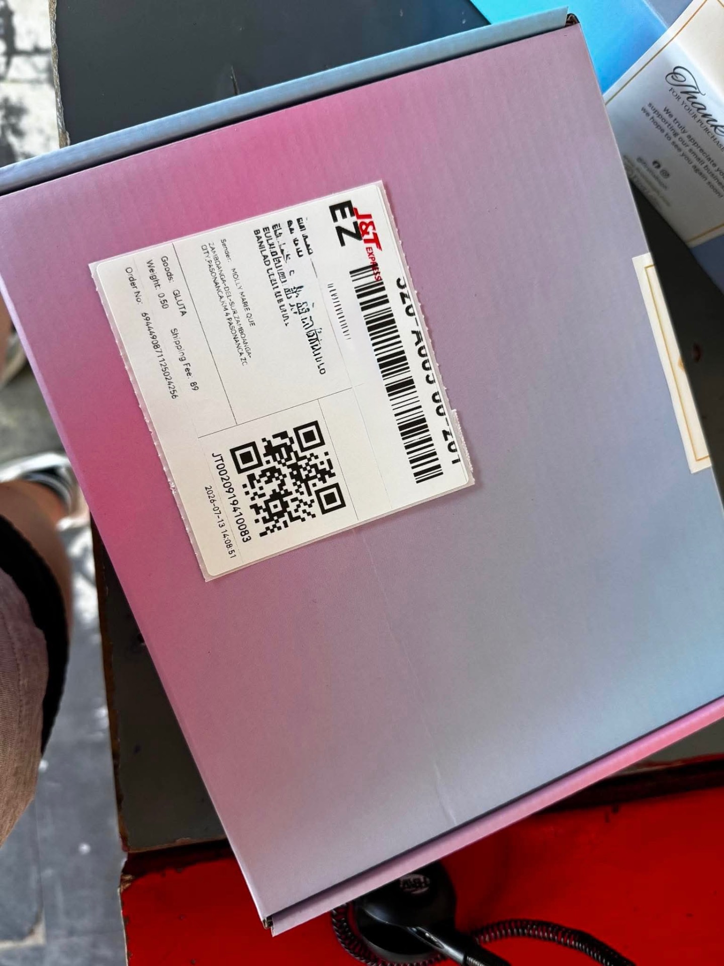 J&T Express glutathione order shipped to a Philippines customer with thank-you card